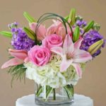 Pink and White Floral design In Glass Vase
